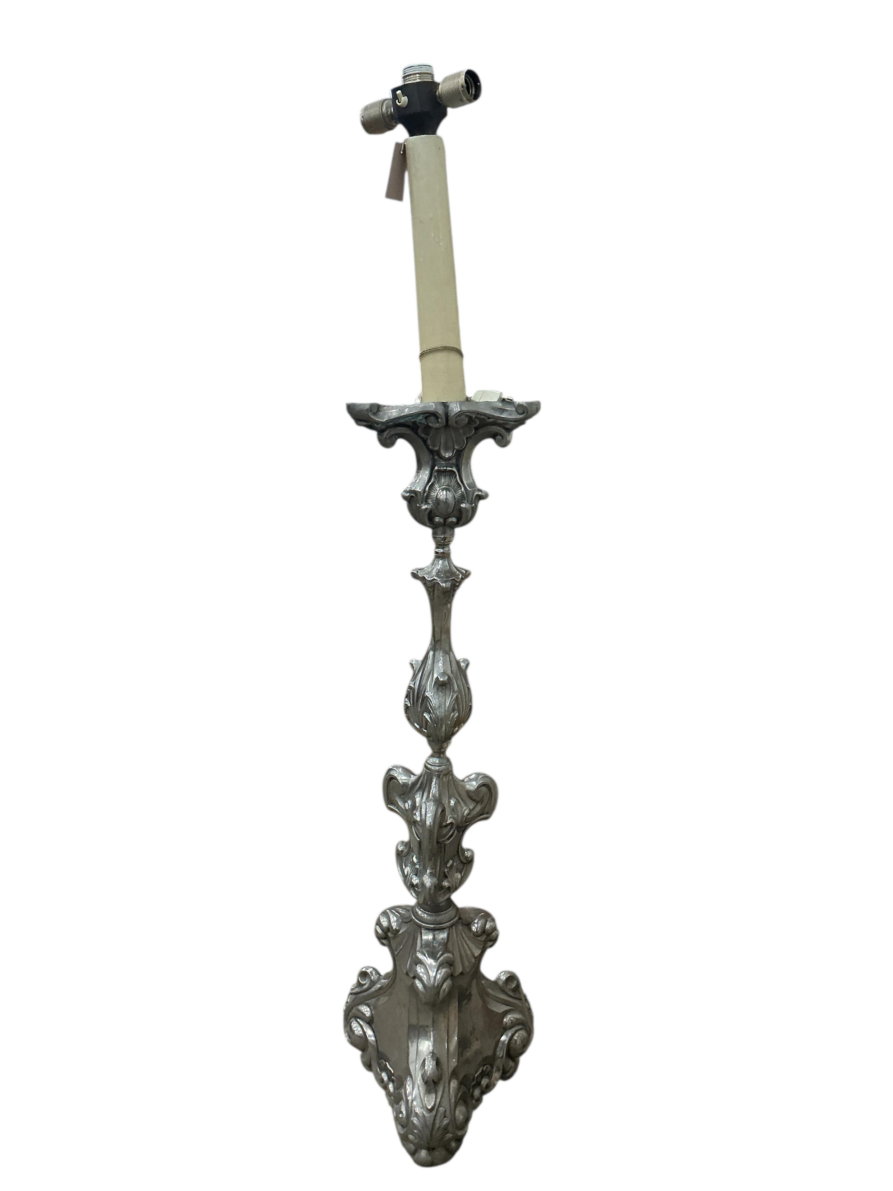 An 18th century style embossed metal standard lamp, height 156cm